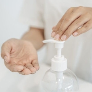 Hand disinfection with dispenser